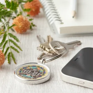 roma whispering fountain premium round keychain on table-1