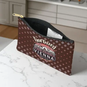 Hofburg in Circles Accessory Pouch on marble table