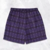 Mytical of the purplish sparkling flower unisex swim shorts back